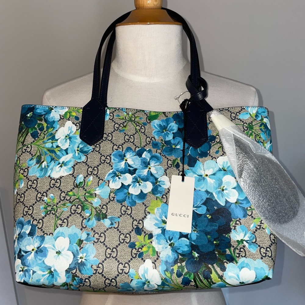 Brand new with tags Gucci beige and blue reversible floral tote.